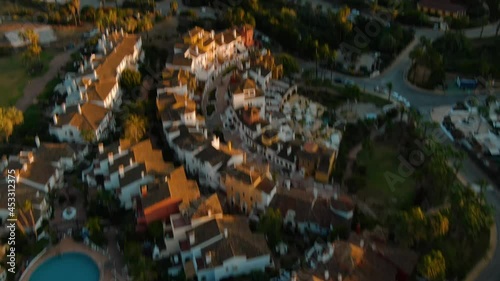 Aerial drone over residential hills at sunset panoramic view photo