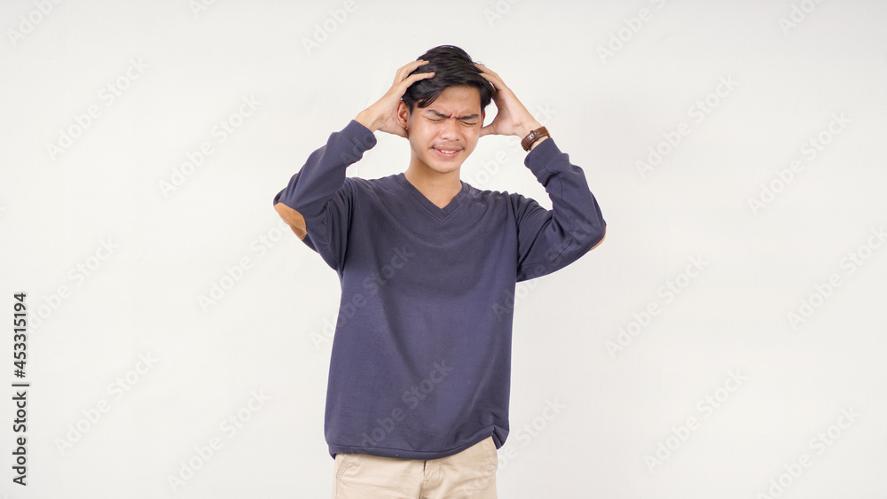 Asian man feeling confused isolated on white background Asian man feeling confused isolated on white background