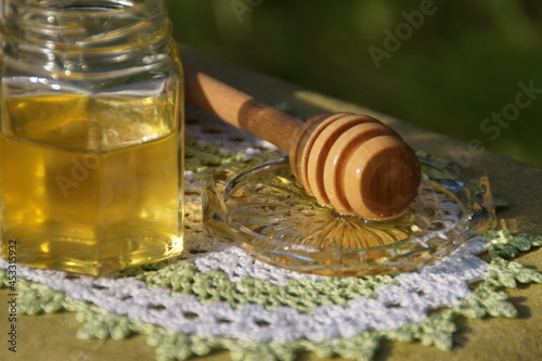 honey dripping from a jar