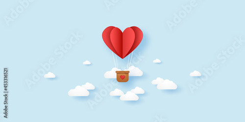 Valentines day, Illustration of love, red folded heart hot air balloon flying in the sky, paper art style