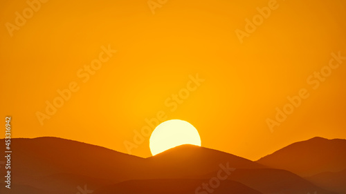 Setting sun over the mountain