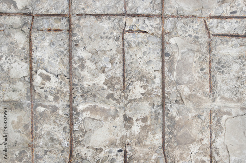 Concrete texture. Concrete wall with rusty reinforcement rods background.Texture of old gray concrete wall for background.Grey grunge textured wall.