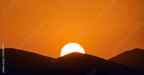 Setting sun over the mountain