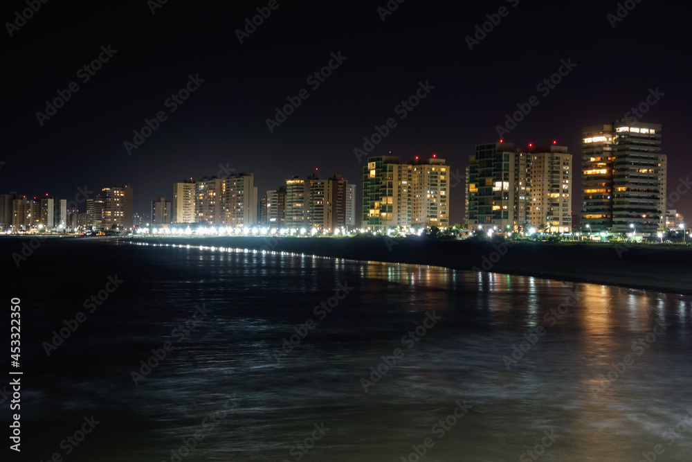sea and cityscape of Sao Luis, Maranhao, Brazil. nightscape, light reflections