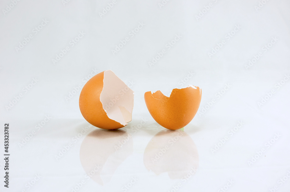 Egg shell isolated on white  background. An empty egg. Broken egg.