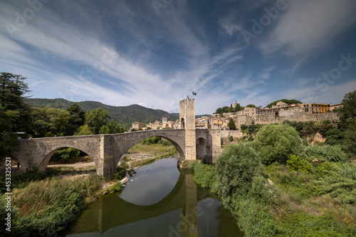 The bridge and river Fluvia at Besalu, Girona, Catalonia, Spain photo