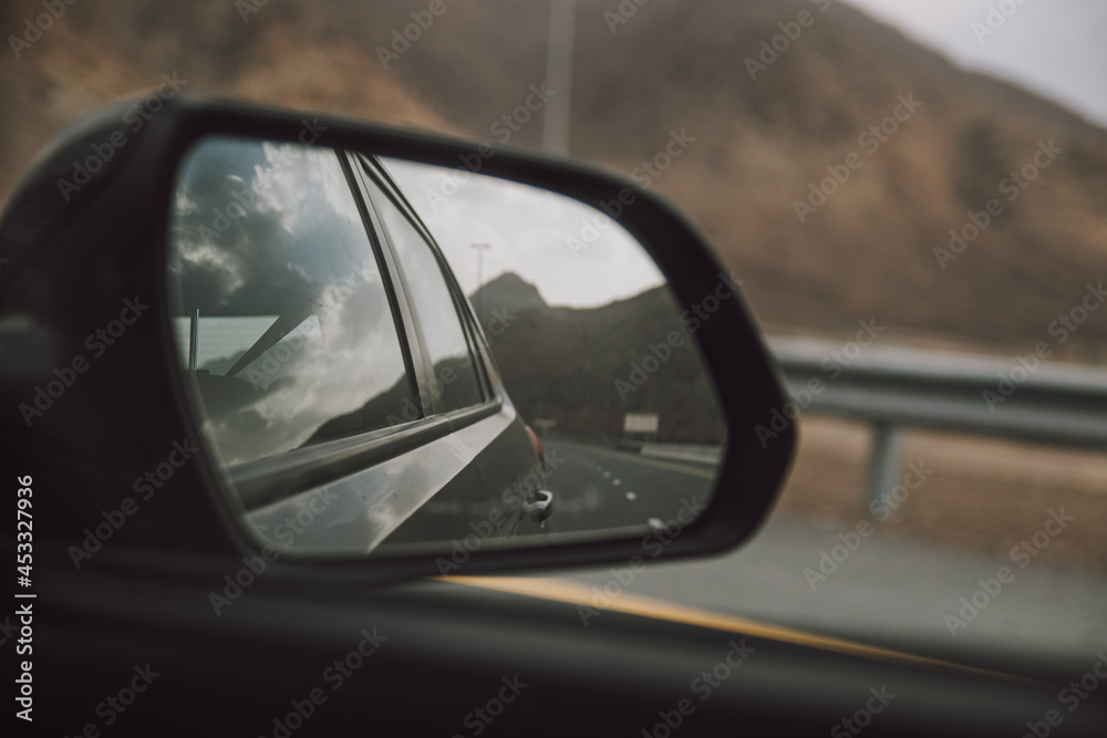 Travelling View in Car Side Mirror