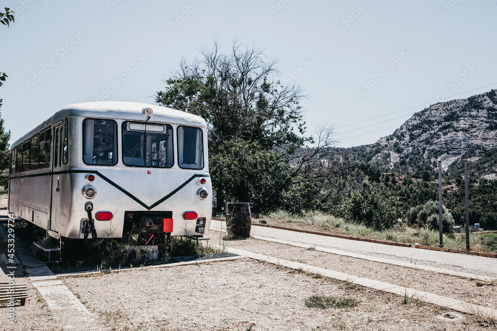 Naklejka premium Old train car of an abandoned train station in the countryside