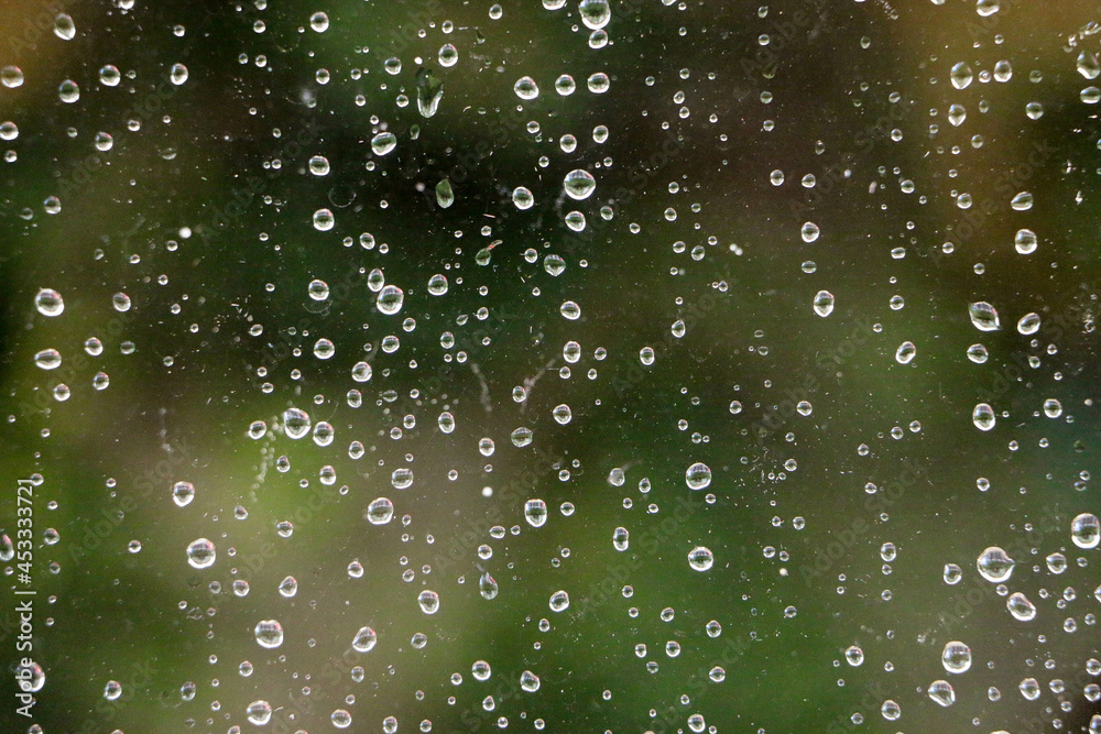 many raindrops at the window