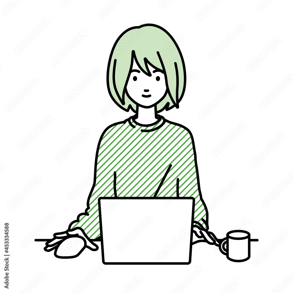 デスクで座ってPCを使っているリモートワークの女性 デスクで座ってPCを使っているリモートワークの女性