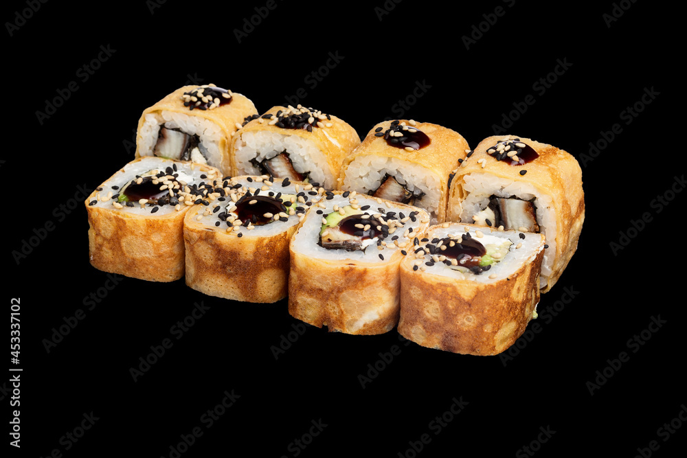 Japanese food: maki and nigiri sushi set on black background. side view composition. Japanese food: maki and nigiri sushi set on black background. side view composition.