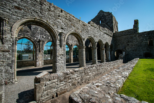Boyle Abbey under the sunlight and a blue sky in Ireland photo
