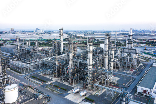 Oil refinery plant from industry zone, Aerial view oil and gas industrial, Refinery factory oil storage tank and pipeline