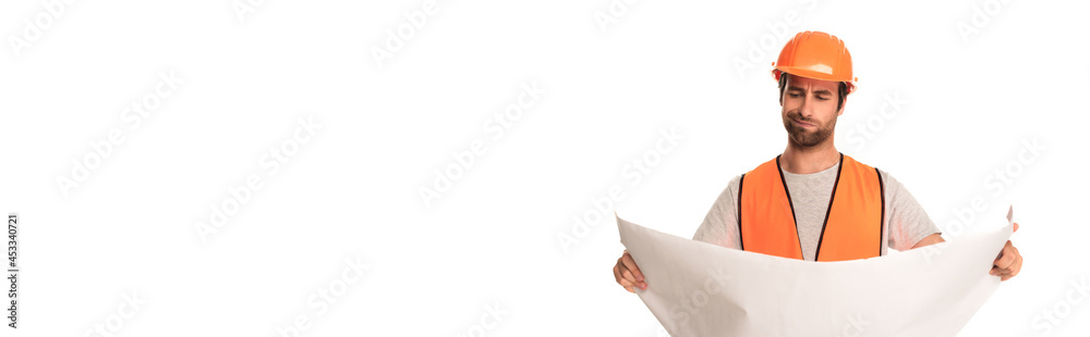 Pensive builder holding blueprint isolated on white, banner Pensive builder holding blueprint isolated on white, banner