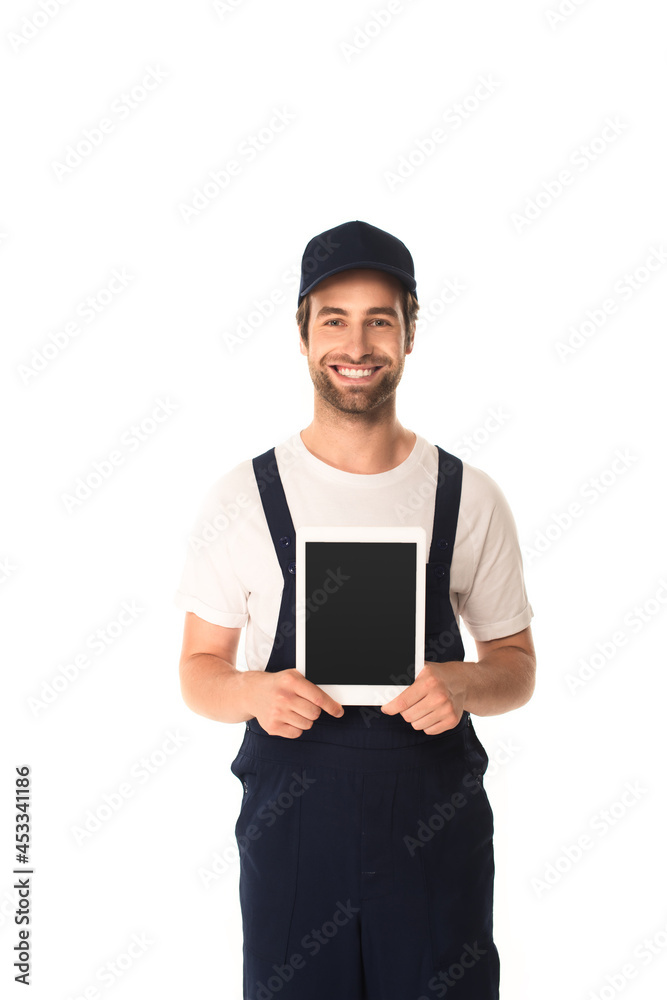 Young cleaner in cap holding digital tablet with blank screen isolated on white Young cleaner in cap holding digital tablet with blank screen isolated on white