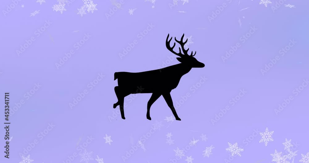 Black silhouette of reindeer walking over snowflakes falling against purple background