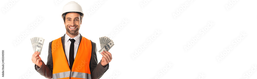 Positive architect holding dollars isolated on white, banner Positive architect holding dollars isolated on white, banner