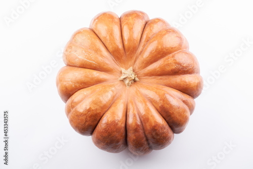 Close-up raw orange pumpkin isolated on white food background