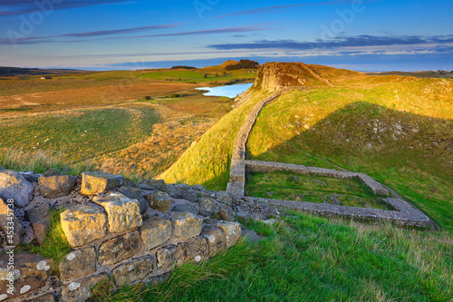 Late Evening Sunlight on Hadrians Wall, Northumberland, England, UK. photo