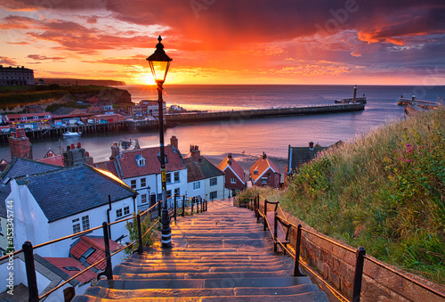 Dramatic Sunset at Whitby after a shower on a Summer Evening. North Yorkshire, England, UK. photo