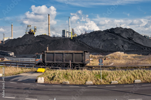 Huge mountains of coal are necessary to keep the kilns burning at Tata Steel. Wijk aan Zee, Noord-Holland province, The Netherlands photo