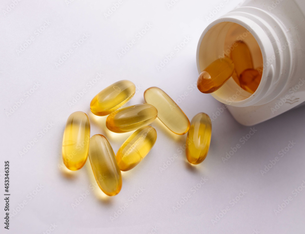 round tablets vitamins a lot in a jar scattering round tablets vitamins a lot in a jar scattering