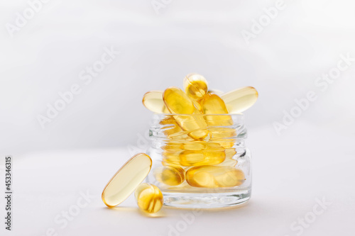 yellow pills omega 3 capsules fish oil for health