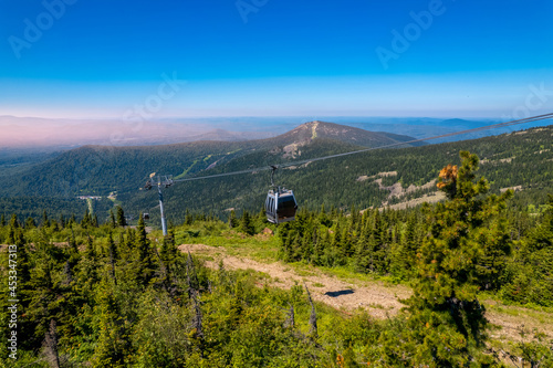 Sheregesh ski lift resort in summer, landscape on mountain and hotels, aerial top view Kemerovo region Russia