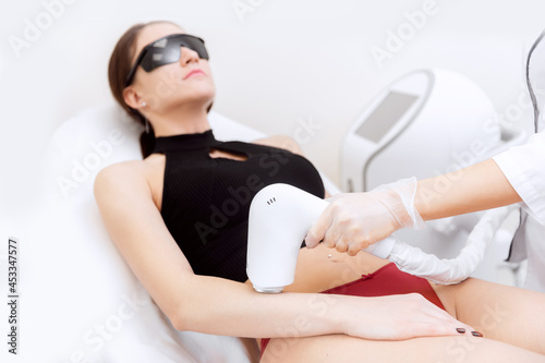 Hand and Arm laser hair removal treatment, body care woman. Concept health and beauty photo