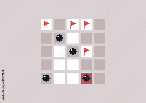 A minefield game, red flags and black mines photo