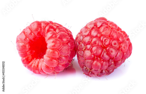 Two ripe raspberries macro close up isolated on white background 