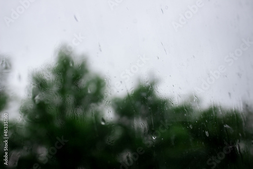 Raindrops on window , rainy day. Background raindrops. blurred background