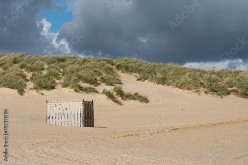 Large metal container on the beach at Camber Sands photo