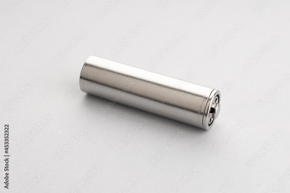 Blank metallic battery isolated on gray background Blank metallic battery isolated on gray background