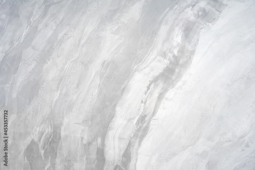 Surface of the grey toned grunge style background Surface of the grey toned grunge style background