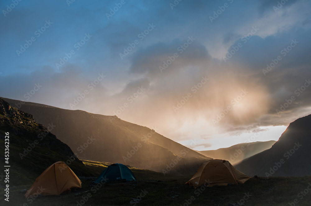 camping in the mountains on the sunrise