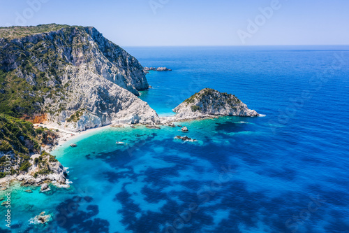 Aerial view Agia Eleni beach in Kefalonia Island, Greece. Remote beautiful rocky beach with clear emerald water and high white cliffs