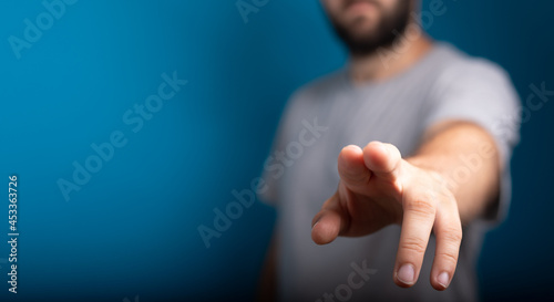 Businessman pointing his fi...