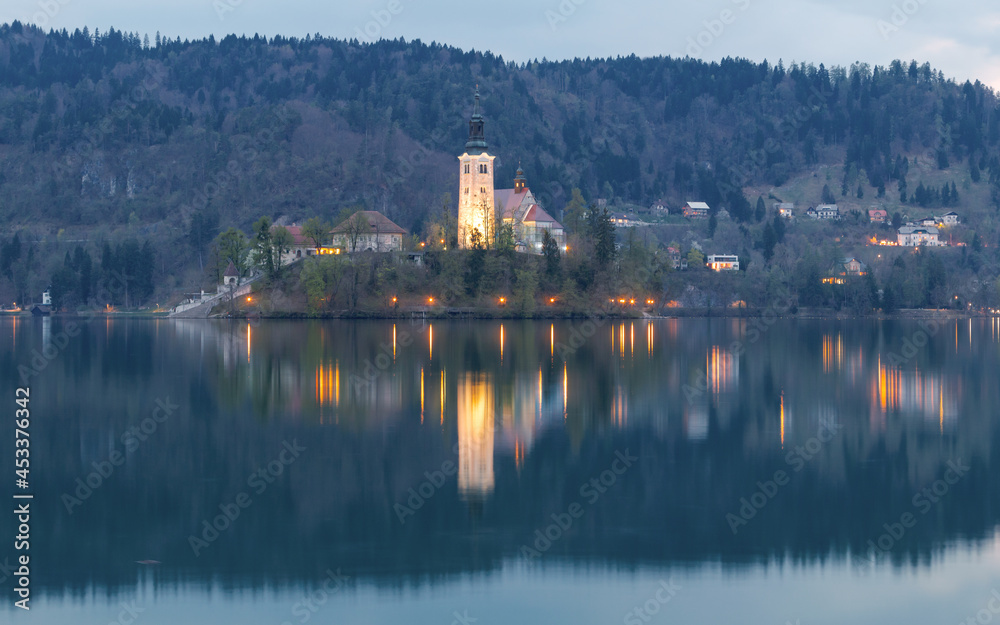 Lake Bled in the middle of the island with the church at sunset in the Triglav National Park, Julian Alps