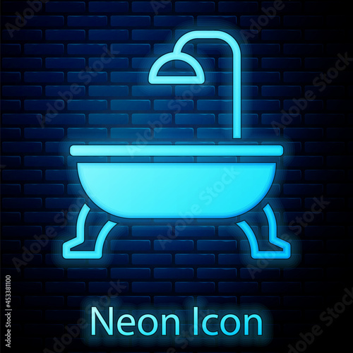 Glowing neon Bathtub icon isolated on brick wall background. Vector