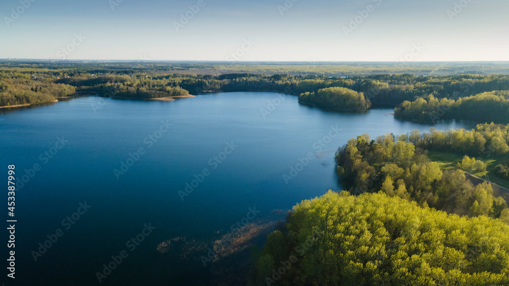 Aerial view of the lake or river with pattern wave. Water surface with ripples texture background. Viewed from above. Environment concept.