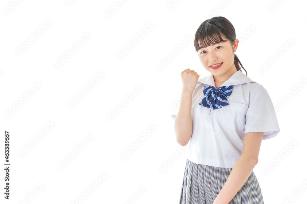 ガッツポーズをする笑顔の女子学生 ガッツポーズをする笑顔の女子学生