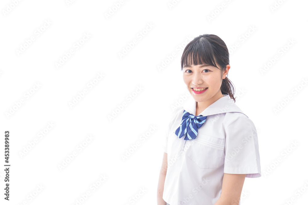 ガイドブックを持ち一人旅をする若い女性 ガイドブックを持ち一人旅をする若い女性