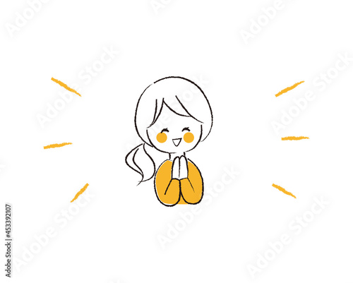 嬉しそうな表情で手を合わせている女性