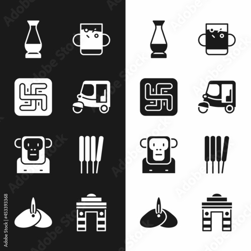 Set Taxi tuk tuk, Hindu swastika, Indian vase, Cup of tea and leaf, Monkey, Aroma sticks, incense, Gate Delhi and headgear turban icon. Vector