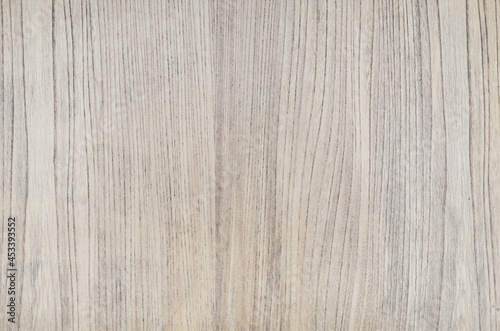 Vertical grained wood board texture background. White wood grain veneer backdrop.
