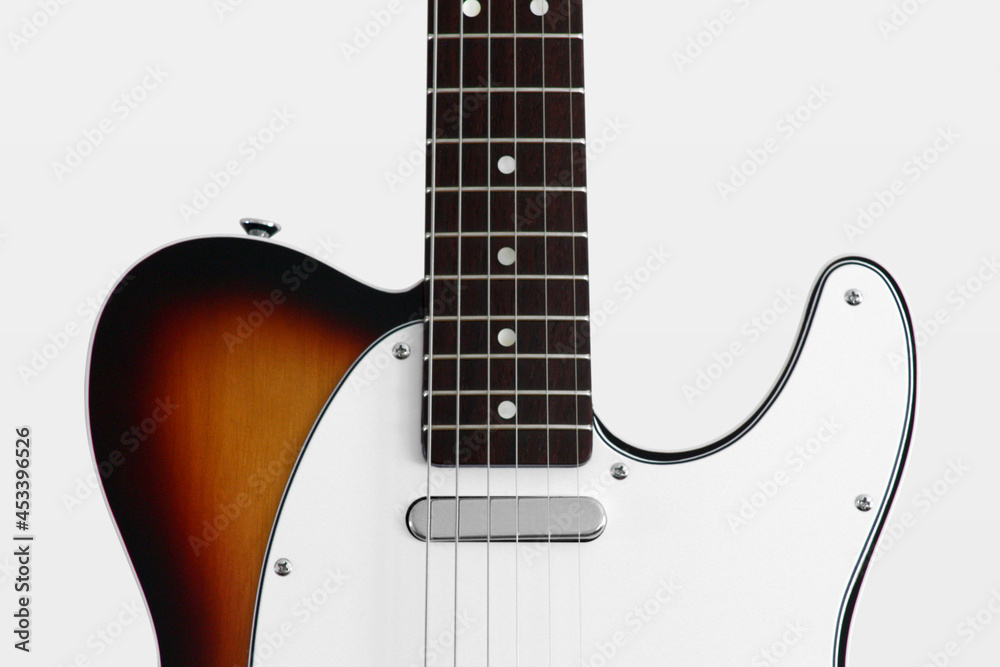 Obraz premium Electric guitar front on white background with pickup, pickguard, frets, neck, strap button and screws
