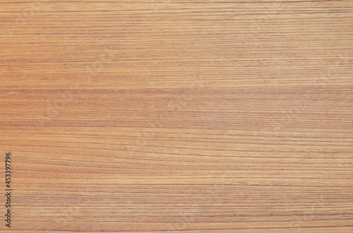 Vertical grained wood board texture background. Brown wood grain veneer backdrop.