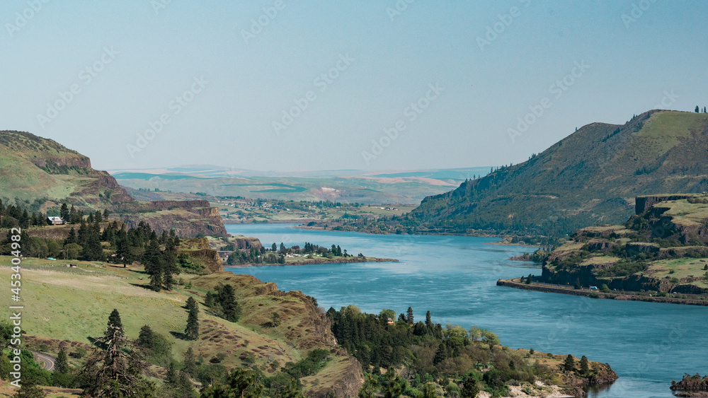 The blue water of the Columbia River winding through the Columbia River Gorge.