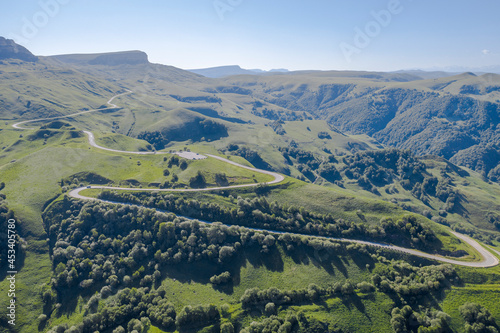Aerial view of the road through the Gum-Bashi mountain pass in Karachay-Cherkessia, Caucasus, Russia